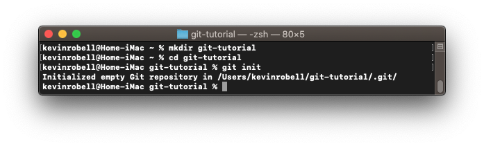 Console window showing how to initialize a git repository using the git init command.